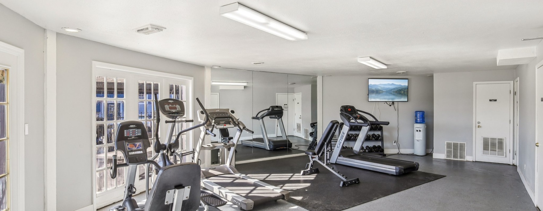 Fitness center, weights and mirror