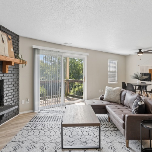 a living room with a couch and a table